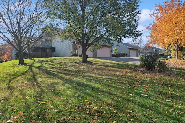 view of yard with a garage