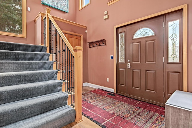 foyer with dark wood-type flooring