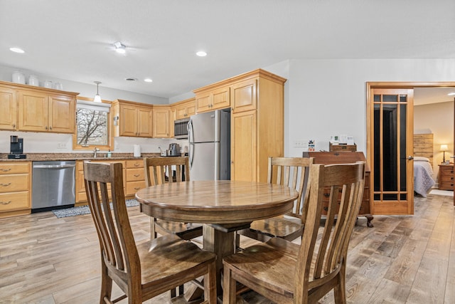 dining area featuring light hardwood / wood-style flooring