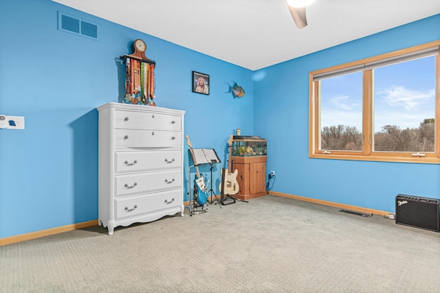 unfurnished bedroom with ceiling fan and light colored carpet