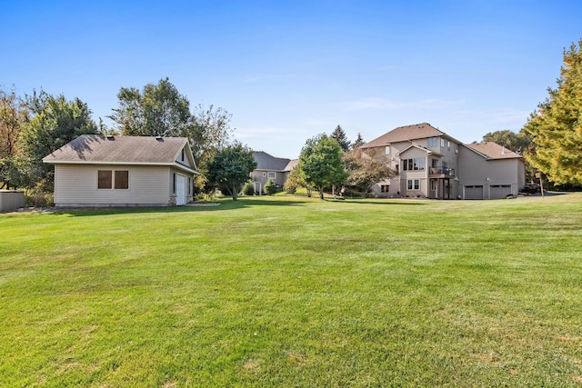 view of yard with a garage