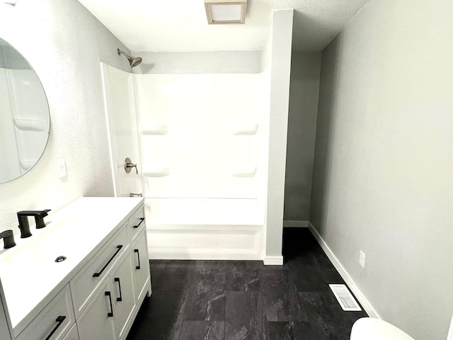 full bathroom featuring vanity, toilet, and shower / bathtub combination