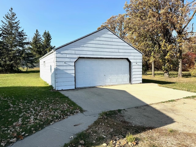 garage with a lawn