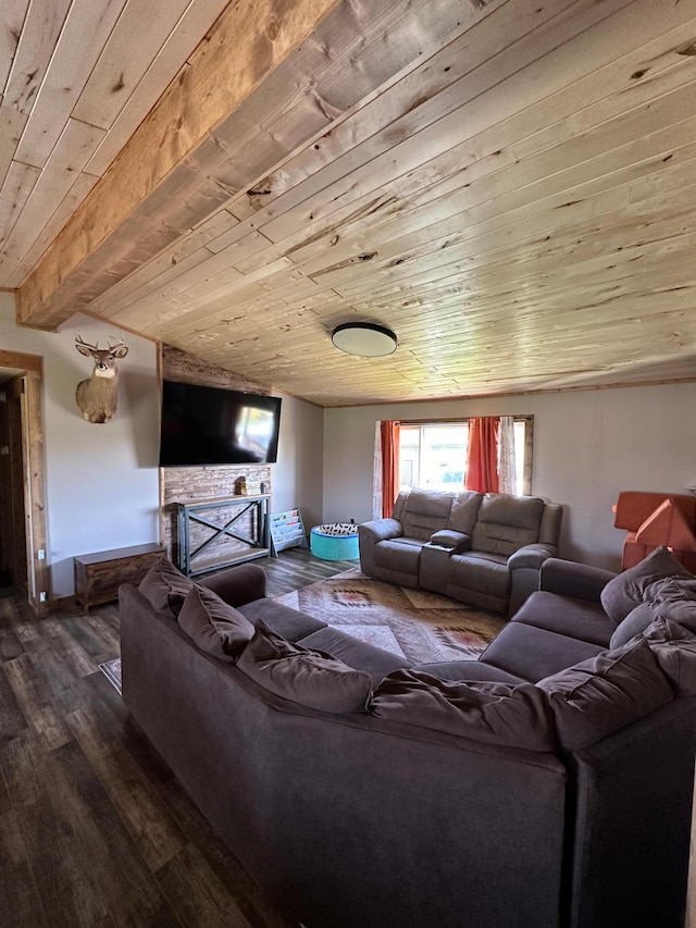 living room with dark hardwood / wood-style floors, wooden ceiling, and a fireplace