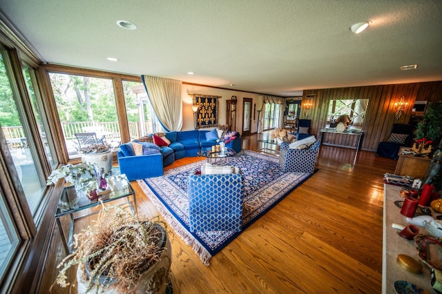 1425 20th St SW, Rochester, MN 55902 - living area featuring plenty of natural light, wood finished floors, and a textured ceiling