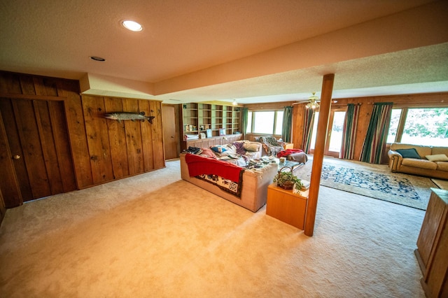 1425 20th St SW, Rochester, MN 55902 - living area with carpet floors, wooden walls, and recessed lighting