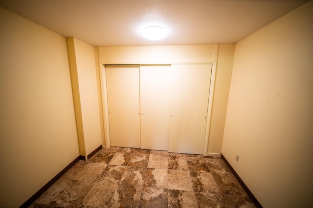 1425 20th St SW, Rochester, MN 55902 - corridor featuring stone finish flooring and baseboards