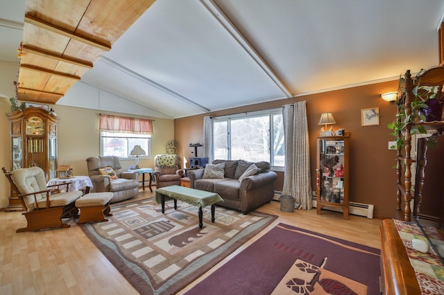 living room with light wood-type flooring, vaulted ceiling, and a baseboard radiator