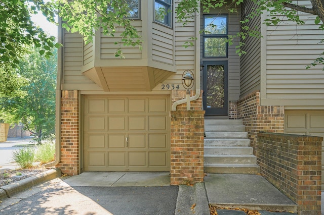 property entrance featuring a garage