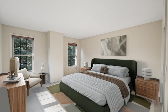 bedroom featuring light colored carpet