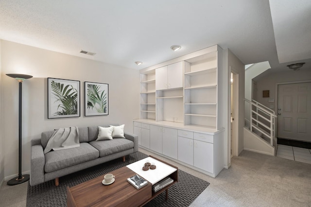 living room featuring light colored carpet