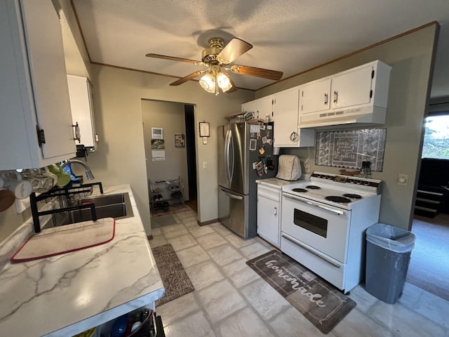 kitchen featuring electric stove, a textured ceiling, stainless steel fridge, ceiling fan, and white cabinets