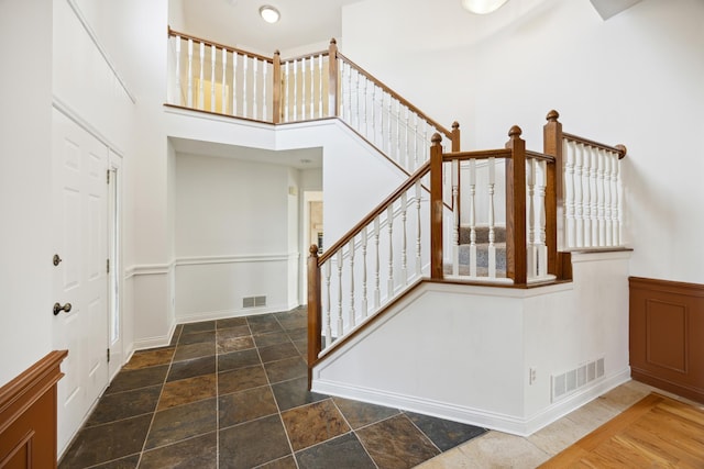 stairway with a high ceiling