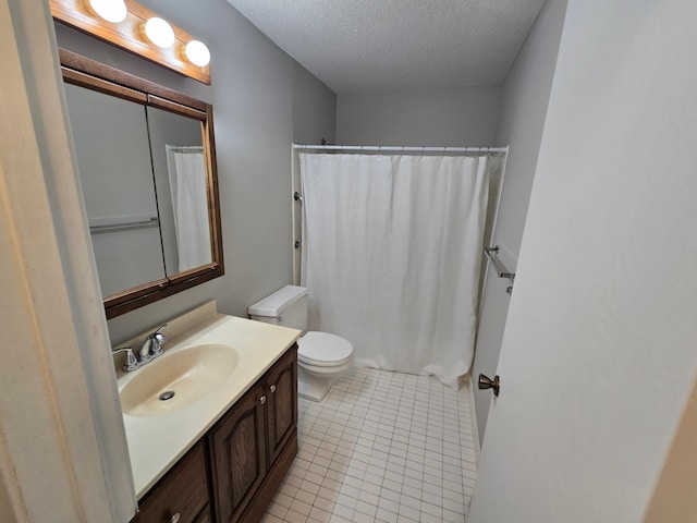 bathroom featuring a textured ceiling, toilet, vanity, a shower with curtain, and tile patterned flooring