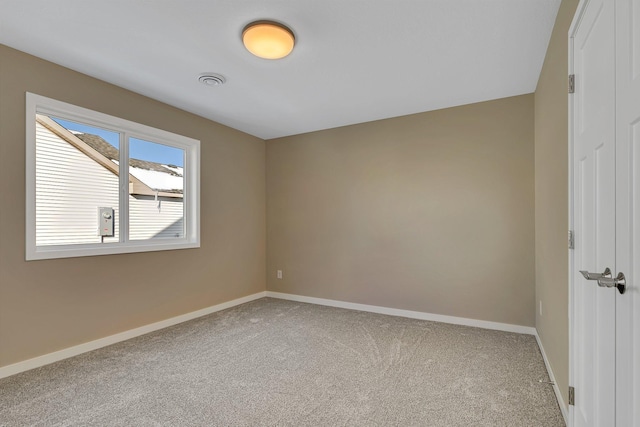 view of carpeted spare room