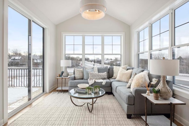 sunroom with vaulted ceiling