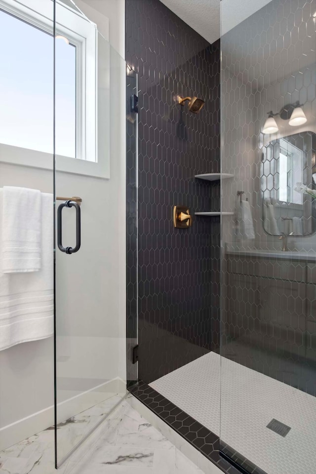 bathroom with an enclosed shower