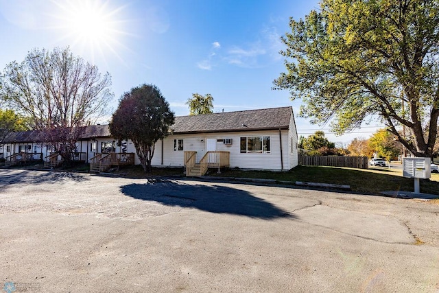 view of front of property with fence