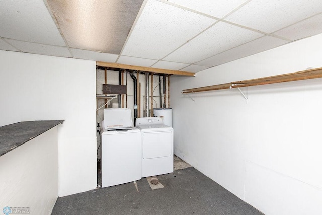 laundry area featuring washing machine and dryer and electric water heater