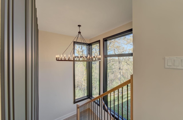 6620 Buckthorn Dr NW, Rochester, MN 55901 - detailed view of a chandelier and baseboards