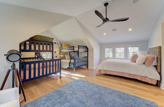 6620 Buckthorn Dr NW, Rochester, MN 55901 - bedroom with wood finished floors, lofted ceiling, baseboards, and a ceiling fan