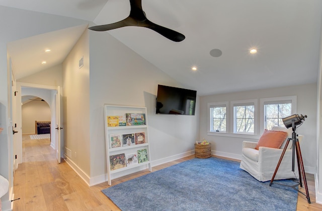 6620 Buckthorn Dr NW, Rochester, MN 55901 - sitting room with vaulted ceiling, arched walkways, light wood-style flooring, ceiling fan, and recessed lighting