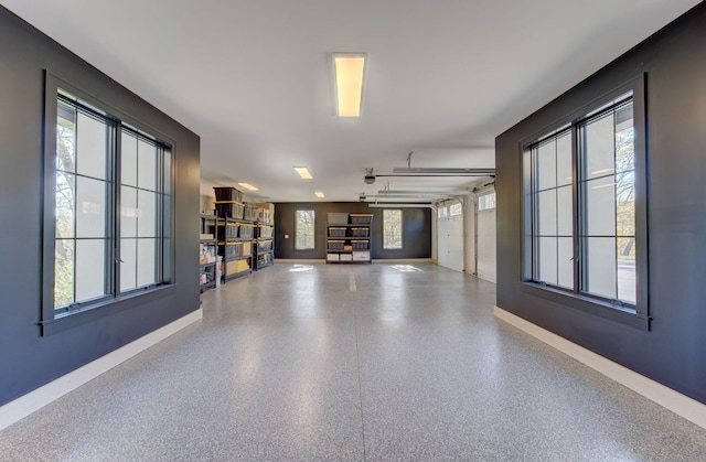 6620 Buckthorn Dr NW, Rochester, MN 55901 - garage with baseboards