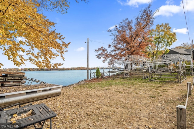 exterior space with a water view