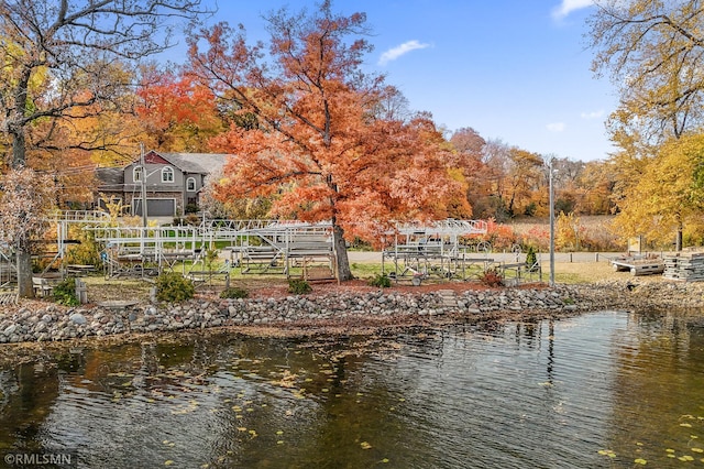 dock area featuring a water view