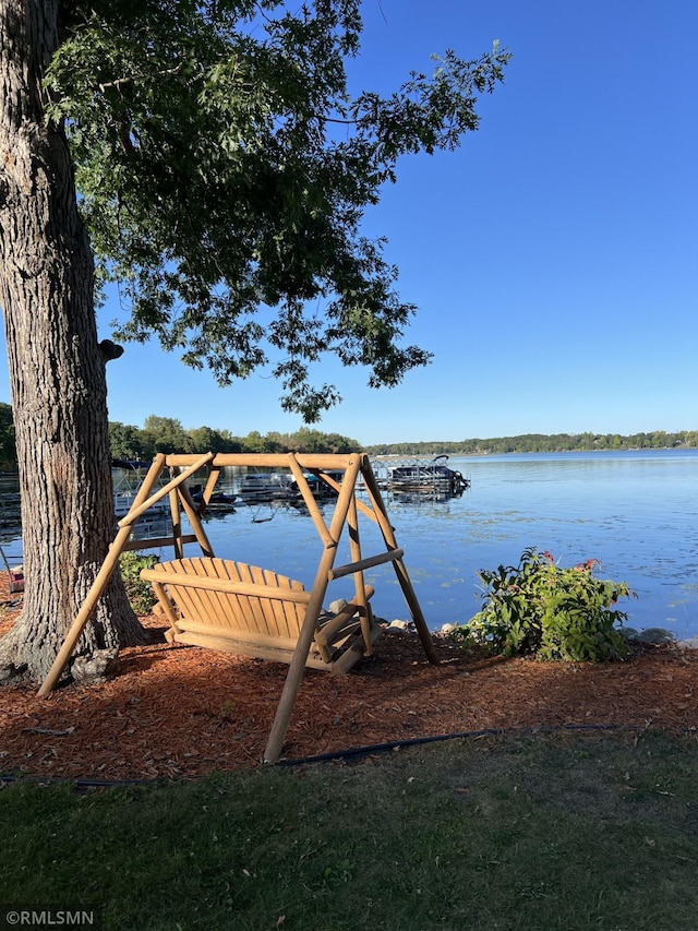 property view of water featuring a boat dock