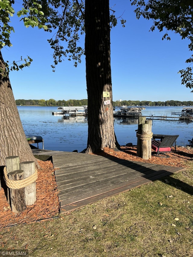 view of dock with a water view