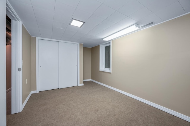 basement with light carpet