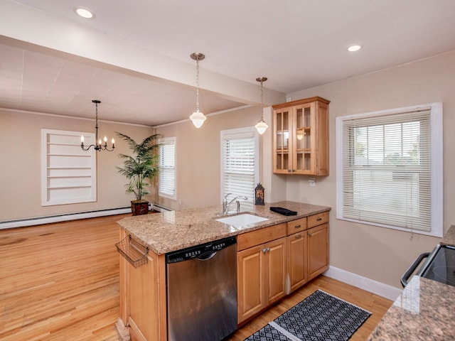 kitchen featuring sink, light wood-type flooring, dishwasher, and a wealth of natural light