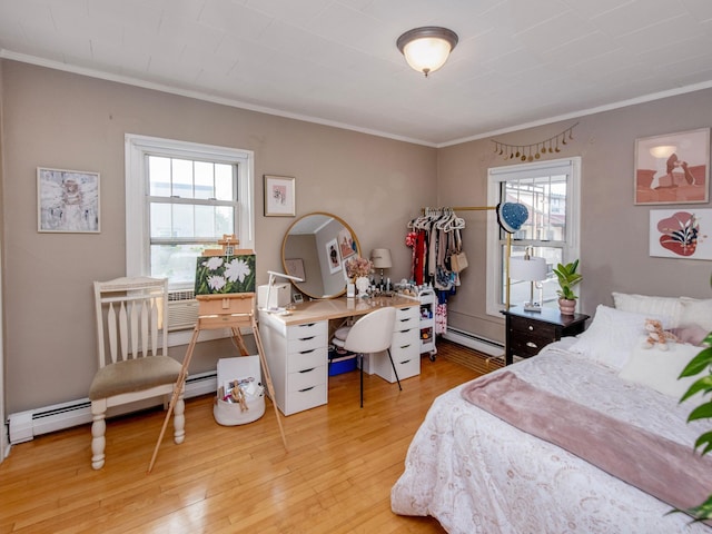 bedroom with a baseboard radiator, hardwood / wood-style flooring, ornamental molding, and multiple windows