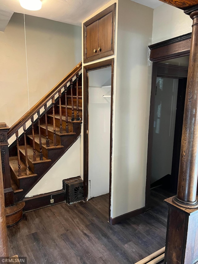 stairway with wood-type flooring