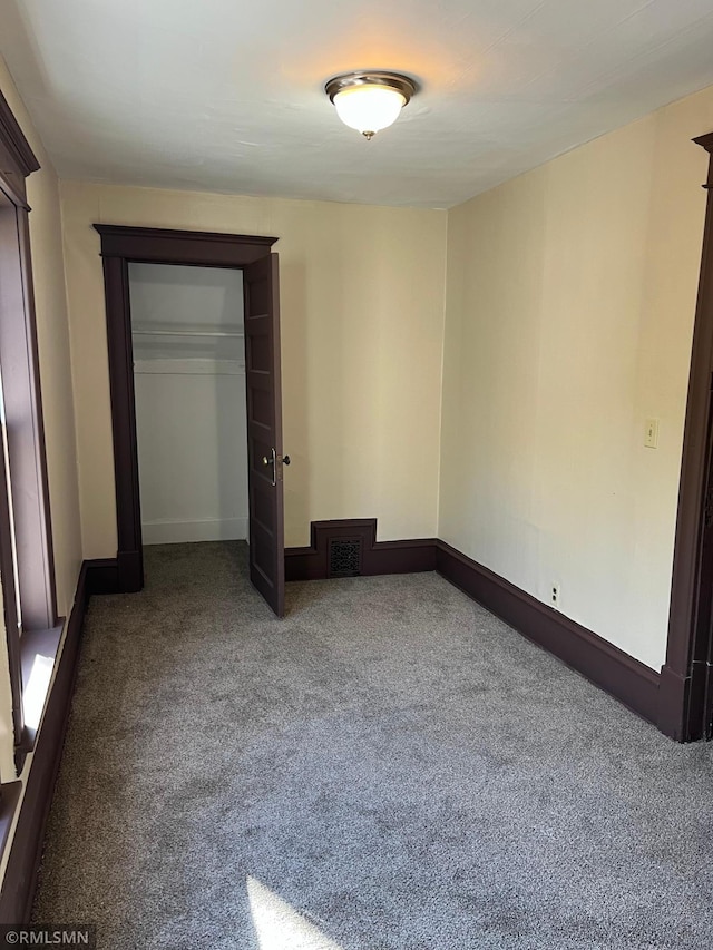 unfurnished bedroom with carpet