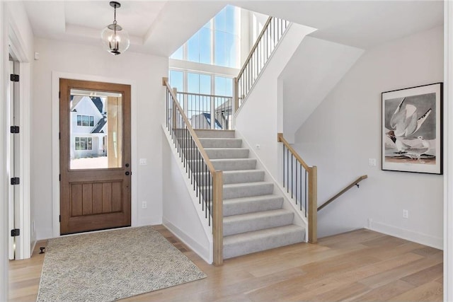 entryway with light hardwood / wood-style flooring