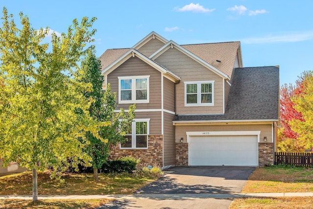 craftsman house featuring a garage