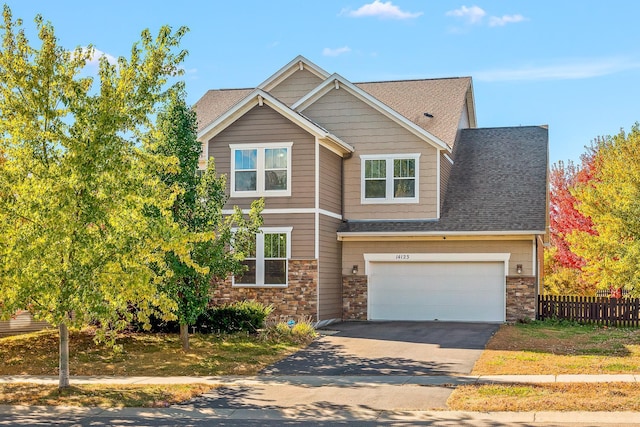 craftsman-style home with a garage