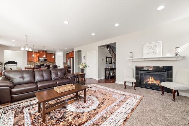 living room featuring a chandelier