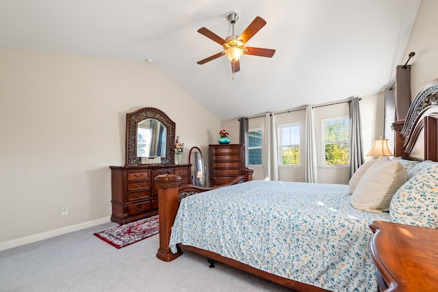 bedroom featuring carpet, ceiling fan, and vaulted ceiling