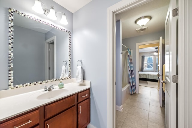 bathroom with vanity, tile patterned floors, and ceiling fan