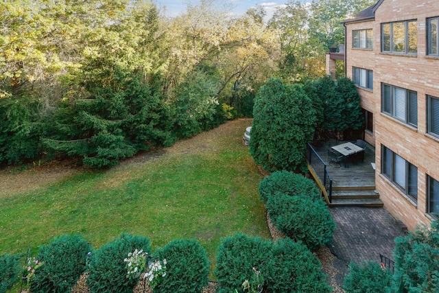 view of yard featuring a wooden deck