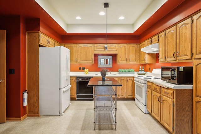 kitchen with sink, decorative light fixtures, white appliances, light carpet, and a kitchen island