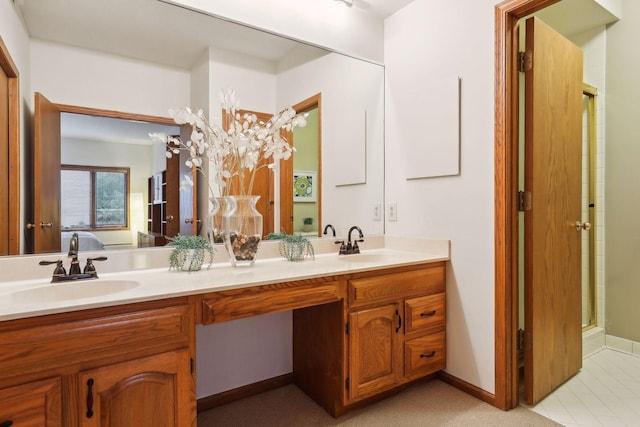 bathroom with vanity, tile patterned floors, and an enclosed shower