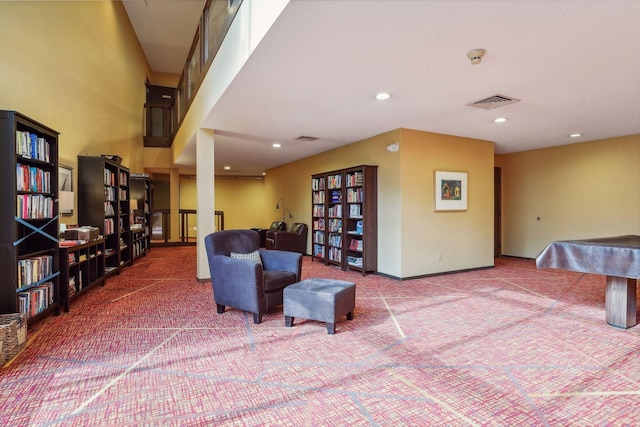 living area featuring carpet flooring