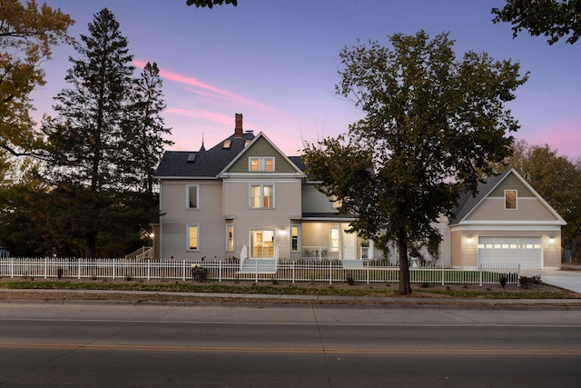 view of front of property featuring a garage