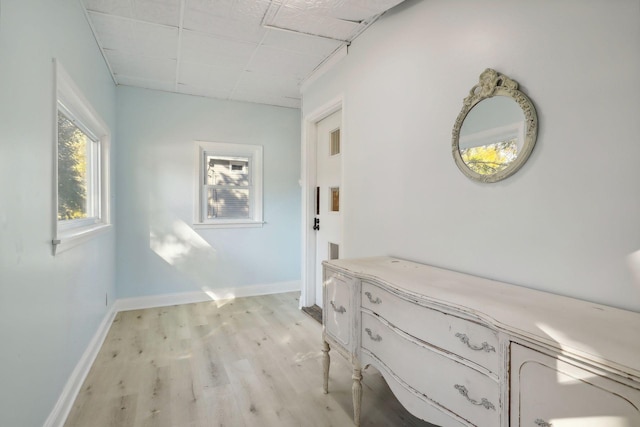 corridor featuring light hardwood / wood-style flooring