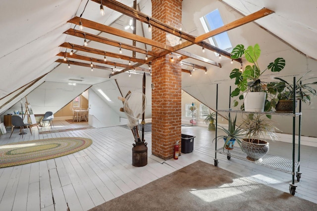 interior space with a healthy amount of sunlight and a skylight