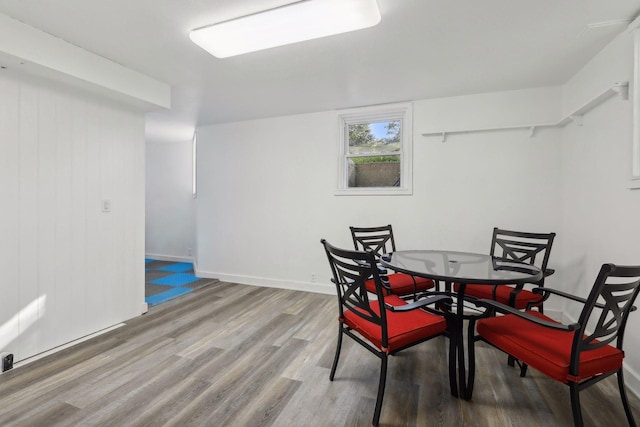 dining room with hardwood / wood-style flooring